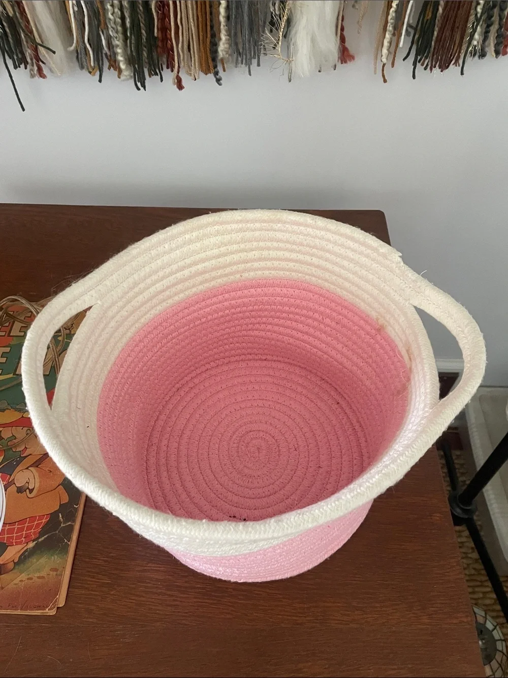 Pink and white braided basket with handles